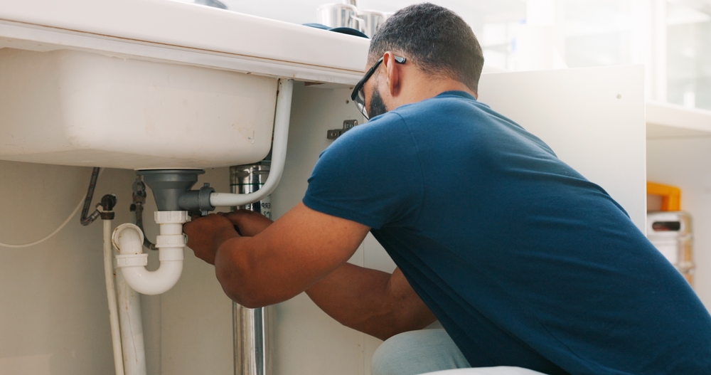 Professional plumber providing residential plumbing solutions for common household plumbing issues
